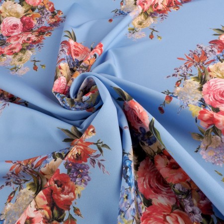 Ramos de flores sobre fondo azul