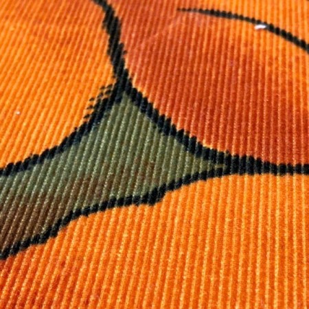 Pana estampada tonos naranjas