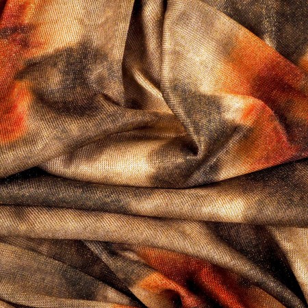 Tejido de Punto con Lurex Dorado – Brillo y Elegancia