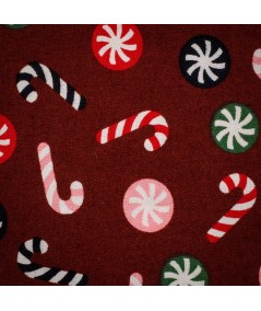 Popelín navideño rojo con bastones de caramelo y bolas navideñas